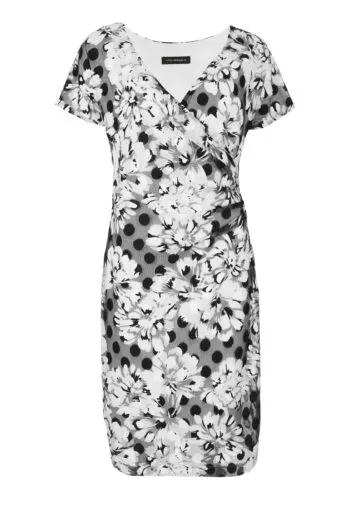 Koperowa sukienka w kwiatki i groszki marki Vito Vergelis