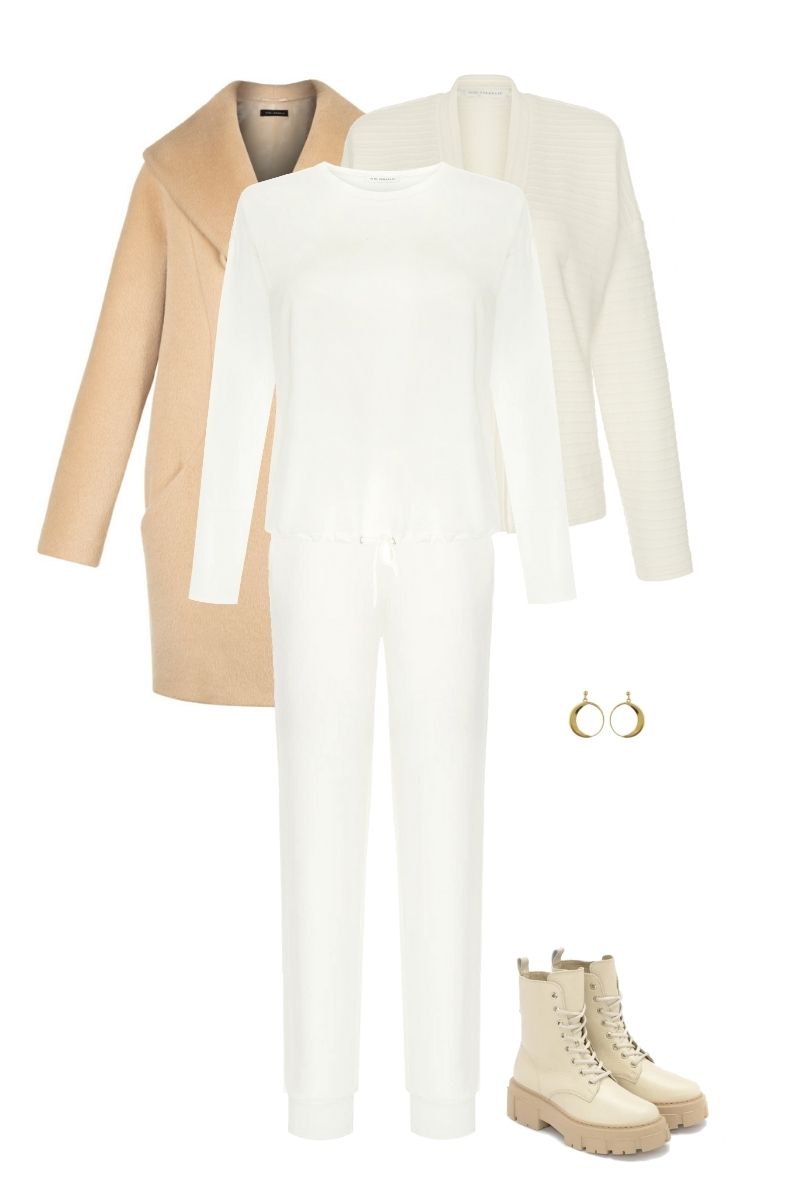 jasna stylizacja na zimę 2022 biały dres i wełniana kurtka beżowa